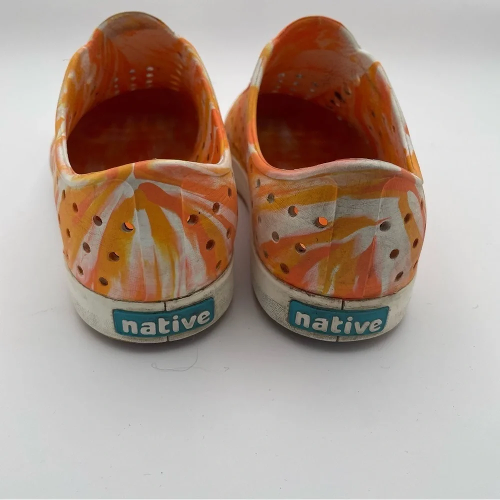 Native orange swirl slip on size 2 water shoes